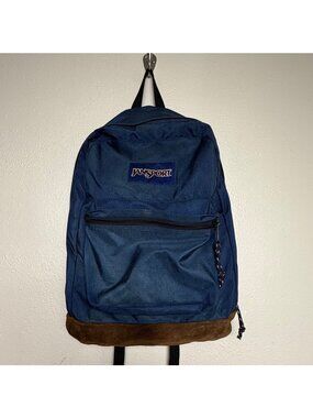 Vintage JanSport Blue Backpack With Brown Suede Bottom
